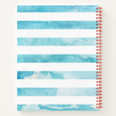 Apple des Lehrers über blaue Wasserfarbenstreifen Notizbuch (Rückseite)