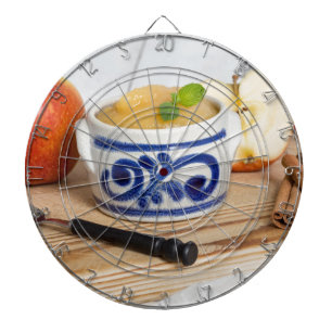 Applesauce with cinnamon in stoneware bowl dartscheibe