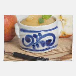Applesauce with cinnamon in stoneware bowl handtuch