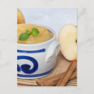 Applesauce with cinnamon in stoneware bowl postkarte