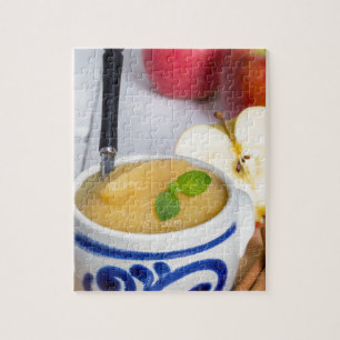 Applesauce with cinnamon in stoneware bowl puzzle