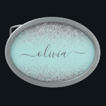 Aqua Blue Aquamarin Silver Glitzer Monogram Ovale Gürtelschnalle<br><div class="desc">Aqua Blue - Aquamarine und Silver Sparkle Glitzer Script Monogram Name Gelt Buckle. Das macht den perfekten Abschluss,  süß 16 16.,  18.,  21.,  30.,  40.,  50.,  60.,  70.,  80.,  90.,  100. Geburtstag,  Hochzeit,  Brautparty,  Jubiläum,  Babydusche oder Junggeselinnen-Abschied Geschenk für jemanden,  der Luxus und Chic Stil Lieben glänze.</div>