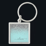 Aqua Blue Aquamarin Silver Glitzer Monogram Schlüsselanhänger<br><div class="desc">Aqua Blue - Aquamarine und Silver Sparkle Glitzer Script Monogram Name Keychains (Key Chain). Das macht den perfekten 16 Geburtstag,  Hochzeit,  Brautparty,  Jubiläum,  Babydusche oder Junggeselinnen-Abschied Geschenk für jemanden,  der Lieben glamourösen Luxus und schicke Stile.</div>