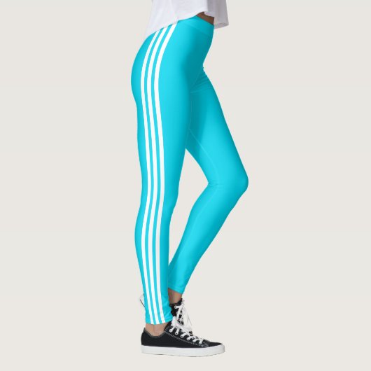 Aquamarine blaue Leggings an der Seite mit benutze (Rechts)