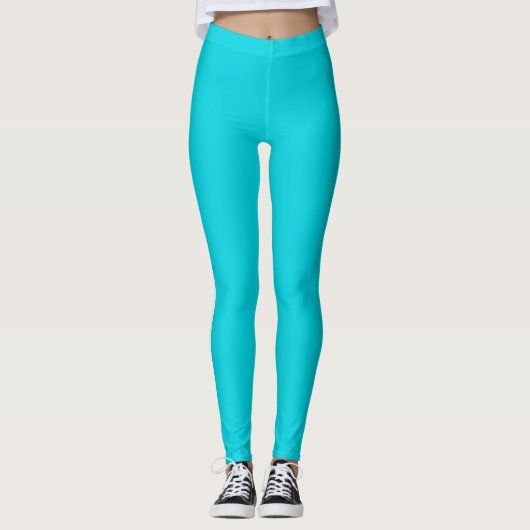 Aquamarine blaue Leggings auf der weißen Seite Far (Vorderseite)