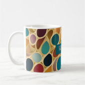 Aquamarine und wine Colordrops auf Gold Kaffeetasse (Links)