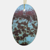 Aquamarines Blau und Lila rostfreier Hintergrund Keramik Ornament (Links)