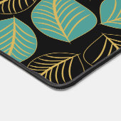 Aquamarines grün goldfarbenes Blätter-Muster auf s Schreibtischunterlage (Ecke)