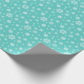 Aquamarines Packpapier mit weißen Schneeflocken (Ecke)