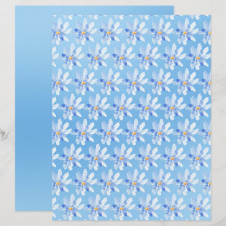Aquarellfarben-Blume auf blauem Scrapbook-Blatt