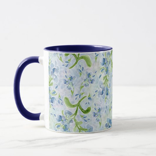 Aquarellfarbene Plumbago-Blume auf Pastellen Tasse (Links)