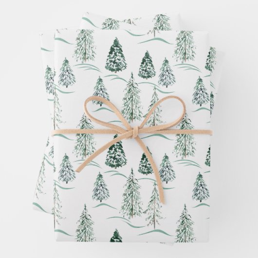 Aquarellfarbene Weihnachtsbäume. Winterwald. Geschenkpapier Set (Beispiel)