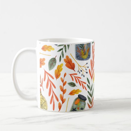 Aquarellmuster mit Herbstblättern. Kaffeetasse (Links)