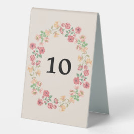 Aquarellring der Blume auf Beige Hochzeitsnummer Tischaufsteller