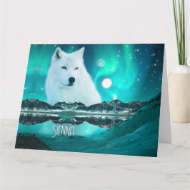 Arktischer Wolf und zauberhafte Nacht mit Nordlich Karte