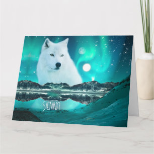 Arktischer Wolf und zauberhafte Nacht mit Nordlich Karte