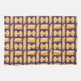 Array of various pasta shapes on a purple geschirrtuch