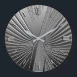 Art Deco Chrom Palmenblatt Große Wanduhr<br><div class="desc">Art-Deco-Motive basierend auf einem stilisierten Palmenblatt,  in einem 3-D-Effekt in silberfarbener Farbe dargestellt</div>