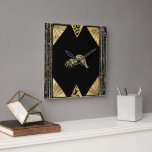 Art Deco I (schwarz/gold) Quadratische Wanduhr<br><div class="desc">Mit dieser Mischung aus Exotik und Art-Déco mit Leoparden und Schwarz-Gold-Komposition wird ein kühnes Statement abgegeben.</div>