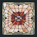 Art Deco Stained Glass 2 Quadratische Wanduhr<br><div class="desc">10.75” x 10.75” acrylic wall clock with an image of Art Deco pink,  red,  blue and green stained glass. Black orbs mark the 12,  3,  6,  and 9 positions. See the entire Roaring 20s Clock collection in the DECOR | Clocks section.</div>