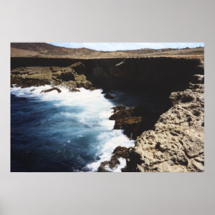 Aruba Ozean kracht auf die Felsen Poster