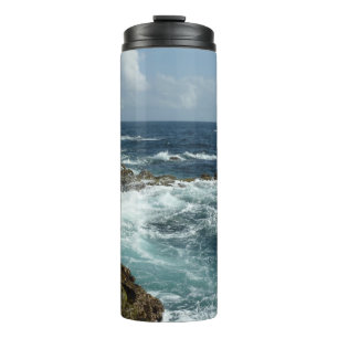 Arubas felsige Küste und blauer Ozean Thermosbecher