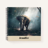 Asiatischer Elefant in einem sonnenbeleuchteten Wa Notizbuch (Vorderseite)