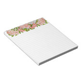 Assortierte Peonies auf einem mittleren Notepad Notizblock (angewinkelt)