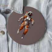 Astronaut im orangen Raumanzug Button (Beispiel)