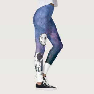 Astronaut im Raum mit Mondballonkosmos spielt die Leggings