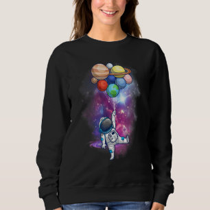 Astronaut mit Planeten in der Hand für Männer Frau Sweatshirt