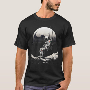 Astronaut sitzt auf Schaukel im Weltraum Sterne un T-Shirt