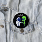Astronaut trifft Alien-Knopf Button (Beispiel)