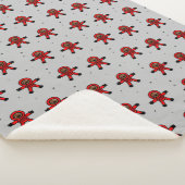 Astronauten des roten Anzugs auf grau Sherpadecke (3/4)