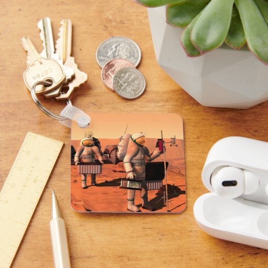 Astronauten richten Wetterausrüstung auf Mars ein. Schlüsselanhänger (Schreibtisch)