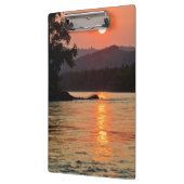 Atemberaubender Sonnenaufgang über dem Foto des Fl Klemmbrett (Links)