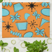 Atomförmige MCM-Formen Türkis auf Orange Geschirrtuch (Gefaltet)