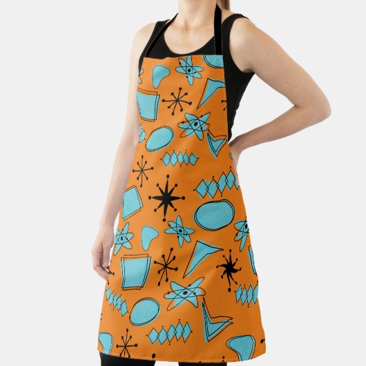 Atomförmige MCM-Formen Türkis auf Orange Schürze (InSitu)