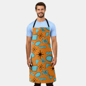 Atomförmige MCM-Formen Türkis auf Orange Schürze (Getragen)