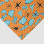 Atomförmige MCM-Formen Türkis auf Orange Seidenpapier (Detail)