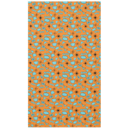 Atomförmige MCM-Formen Türkis auf Orange Tischdecke