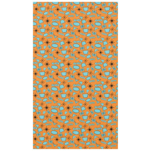 Atomförmige MCM-Formen Türkis auf Orange Tischdecke (Vorderseite)