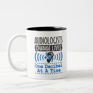 Audiologen verändern Leben je eine Entschlossenhe Zweifarbige Tasse