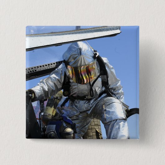 Auf dem Cockpit wird eine Rettungsübung durchgefüh Button (Vorderseite)