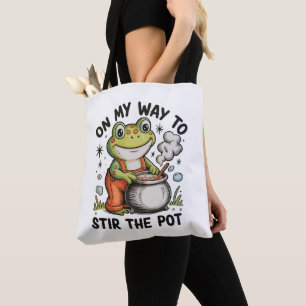 Auf dem Weg, den Topf umzurühren Lustiger Frosch S Tasche