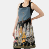 Auf offenem Feld stehen verschiedene Surfbretter Schürze (InSitu)