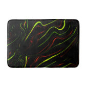 Auf schwarzem Fond zeigen sich die grünen und rote Badematte (Vorderseite)