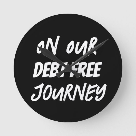 Auf unserer kostenlosen Schulden Runde Wanduhr (Vorderseite)