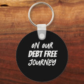 Auf unserer kostenlosen Schulden Schlüsselanhänger (Vorderseite)