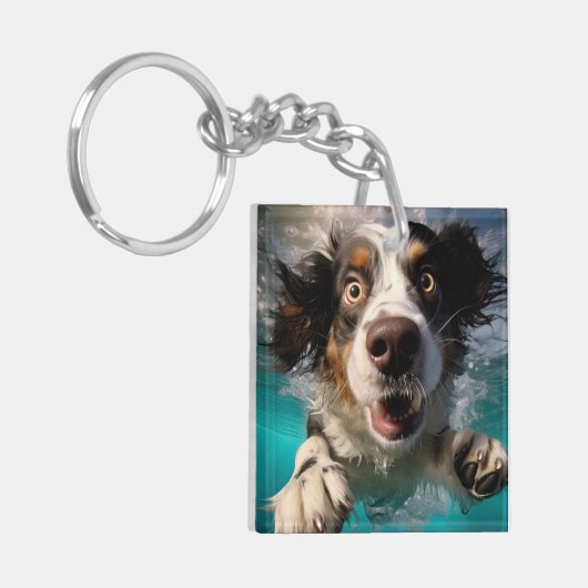 Aufgeregtes Hundeschwimmen unter Wasser Schlüsselanhänger (Vorderseite links)